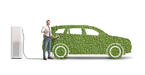 Businessman Charging Station Pointing Green Electric Suv Isolated White Background — Stock Photo, Image