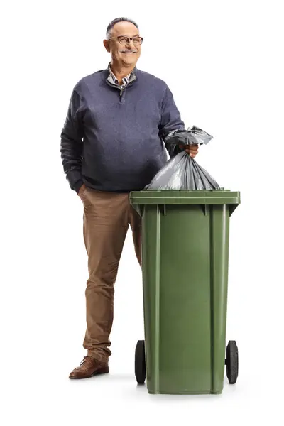 Smiling Mature Man Throwing Waste Bag Dustbin Isolated White Background — Stock Photo, Image