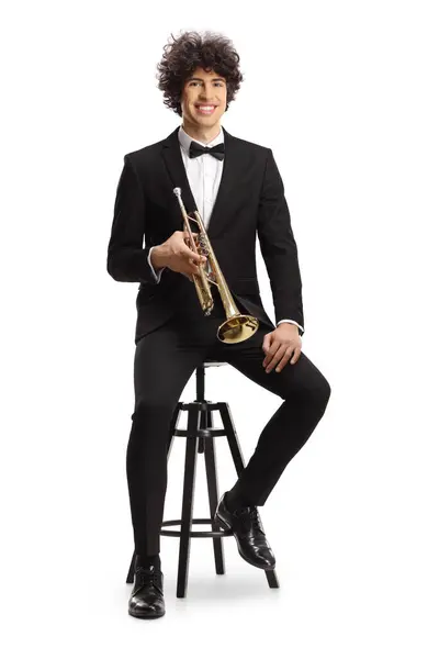 Smiling Young Male Musician Black Suit Holding Trumpet Sitting Chair — Stock Photo, Image