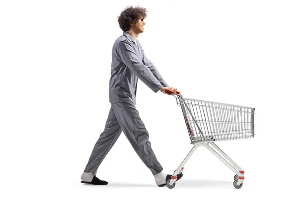 Man Pajamas Pushing Empty Shopping Cart Isolated White Background — Stock Photo, Image