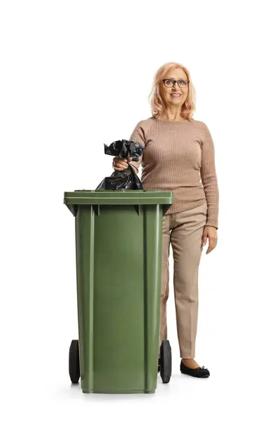 Full Length Portrait Middle Aged Woman Throwing Waste Bag Bin — Stock Photo, Image