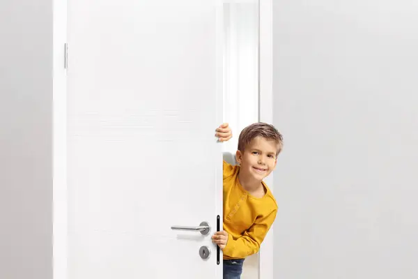 Cute Boy Peeking Door — Stock Photo, Image