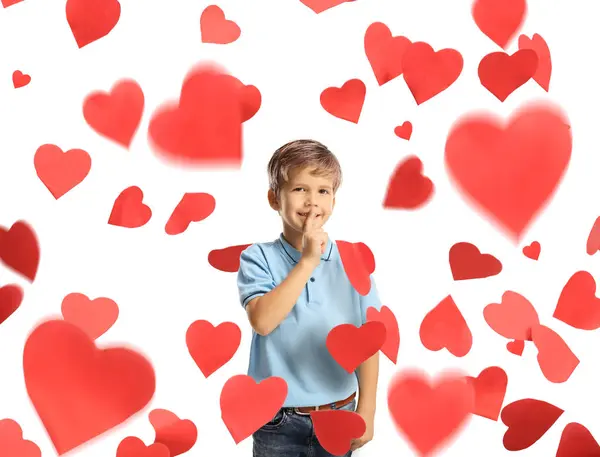 Симпатичный Маленький Мальчик Gesutring Молчание Пальцем Красными Сердцами Изолированы Белом Стоковое Фото