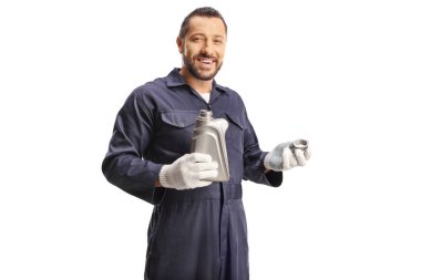 Car mechanic holding engine oil isolated on white background clipart