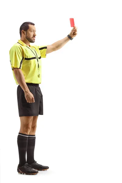 stock image Full length shot of a football referee holding a red card isolated on white background