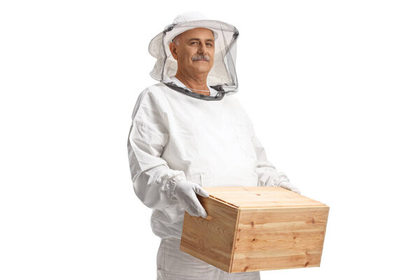 Bee keeper in a uniform holding a crate isolated on white background