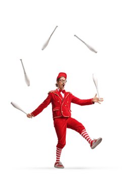 Entertainer in a red suit juggling isolated on white background