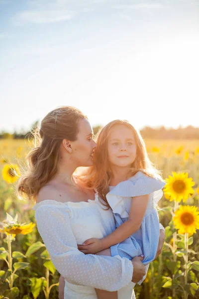 Mom Hugs Her Little Daughter Beautiful Young Woman Year Old — Zdjęcie stockowe