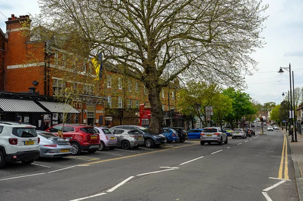 stock image Chislehurst, Kent, UK: View of Chislehurst High Street with shops, restaurants and cars. Chislehurst is in the Borough of Bromley, Greater London.