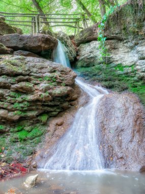 Waterfall Kartala located near Veliko Tarnovo, Bulgaria. Water stream in the forest