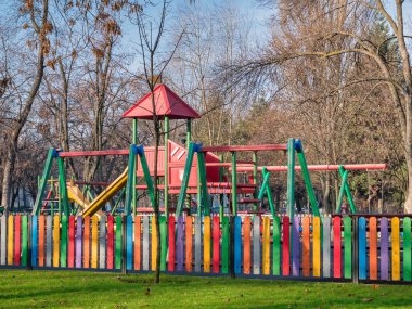 An empty children's playground in Drumul Taberei park Bucharest, Romania.