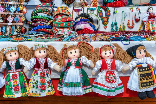 Hand made dolls dressed in romanian traditional folk costumes.