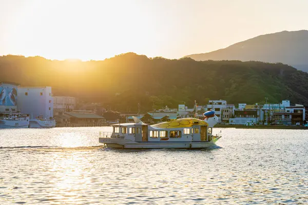 stock image Nachikatsuura, Japan - 05.10.2024: Small cruise boat across the Pacific coast line in Nachikatsuura, Higashimuro District, Wakayama