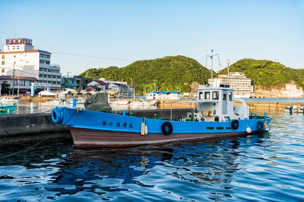 stock image Nachi-Katsuura, Japan -05.10.2024: A fishing boat at the docks in the harbor or pier. Nachikatsuura at sunset.