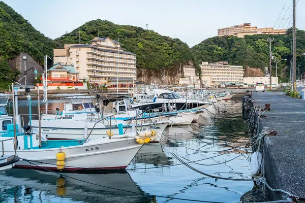 stock image Nachikatsuura, Japan - 05.10.2024: Fishing boats at the docks in the harbor or pier in Nachikatsuura, Japan.