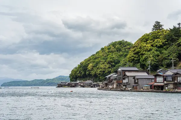 stock image Beautiful scenic view with the wooden traditional waterfront boat houses called funaya around Ine Bay, in the village Ine, Japan