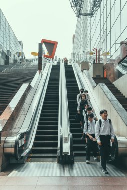 Kyoto, Japan - 05.07.2024: The escalator that goes to the sky garden at Kyoto station. clipart