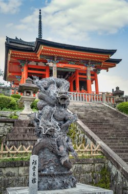 Shoun Seiryu dragon sculpture at the base of Nishimon temple inside Kiyomizu-dera complex, in Kyoto. clipart