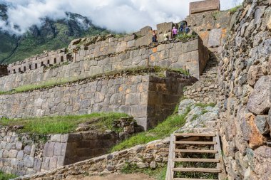 Cusco, Peru - March 17, 2025: Group of tourists at Ollantaytambo Archeological Site in the Sacred Valley of the Incas, Peru.