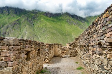 Scenic landscape view with the inca ruins at Ollantaytambo Archeological Site in the Sacred Valley of the Incas, Peru.