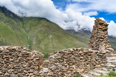 Scenic landscape view with the inca ruins at Ollantaytambo Archeological Site in the Sacred Valley of the Incas, Peru.