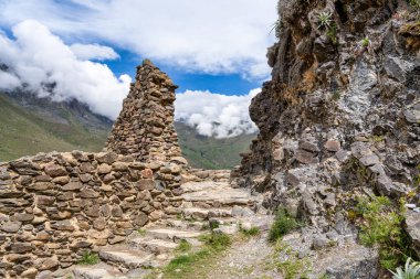 Scenic landscape view with the inca ruins at Ollantaytambo Archeological Site in the Sacred Valley of the Incas, Peru.
