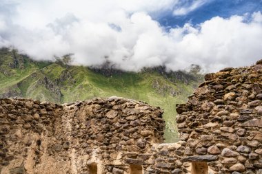 Scenic landscape view with the inca ruins at Ollantaytambo Archeological Site in the Sacred Valley of the Incas, Peru.