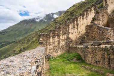 Scenic landscape view with the inca ruins at Ollantaytambo Archeological Site in the Sacred Valley of the Incas, Peru.
