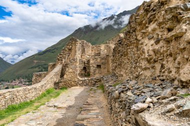 Scenic landscape view with the inca ruins at Ollantaytambo Archeological Site in the Sacred Valley of the Incas, Peru.