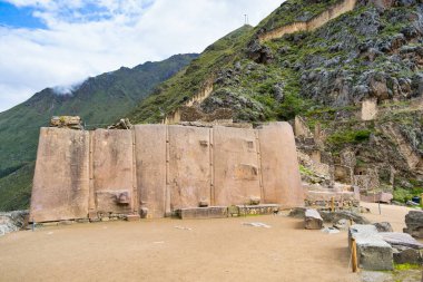 Temple del Sol or Sun Temple, a wall of six monoliths stone blocks at Ollantaytambo archaeological site, in the Sacred Valley of Peru