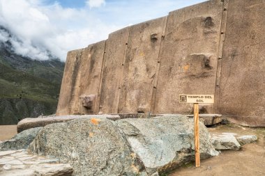 Temple del Sol or Sun Temple, a wall of six monoliths stone blocks at Ollantaytambo archaeological site, in the Sacred Valley of Peru