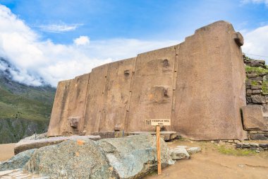 Temple del Sol or Sun Temple, a wall of six monoliths stone blocks at Ollantaytambo archaeological site, in the Sacred Valley of Peru