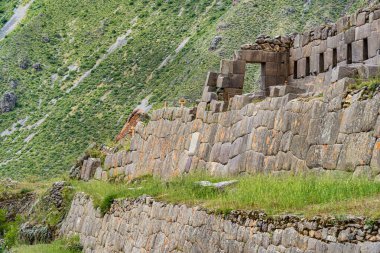 Scenic landscape view with Ollantaytambo Archeological Site in the Sacred Valley of the Incas, Peru.