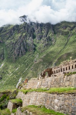Scenic landscape view with Ollantaytambo Archeological Site in the Sacred Valley of the Incas, Peru.
