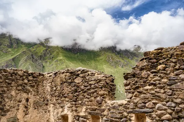 Scenic landscape view with the inca ruins at Ollantaytambo Archeological Site in the Sacred Valley of the Incas, Peru.