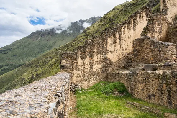 Scenic landscape view with the inca ruins at Ollantaytambo Archeological Site in the Sacred Valley of the Incas, Peru.