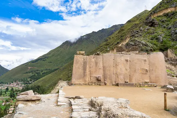 Temple del Sol or Sun Temple, a wall of six monoliths stone blocks at Ollantaytambo archaeological site, in the Sacred Valley of Peru