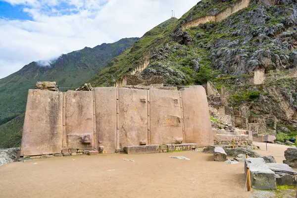 Temple del Sol or Sun Temple, a wall of six monoliths stone blocks at Ollantaytambo archaeological site, in the Sacred Valley of Peru