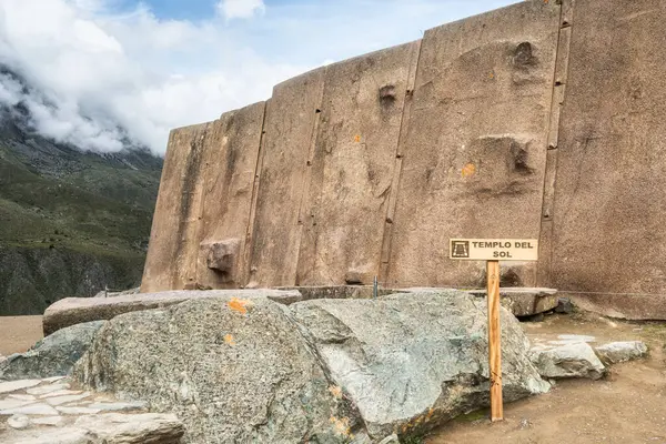 Temple del Sol or Sun Temple, a wall of six monoliths stone blocks at Ollantaytambo archaeological site, in the Sacred Valley of Peru