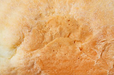 Close up photo texture of baked bread crust.