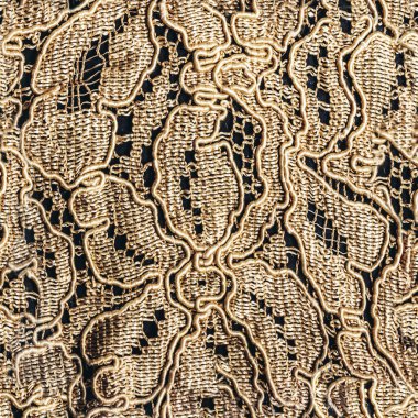 Koyu arkaplanda bej rengi pamuklu dantelli çiçek desenli kusursuz bir fotoğraf..