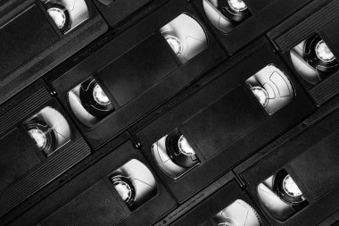 Analog video kasetlerinin yüzey, doku, üst görünüm üzerine yerleştirilmiş hali.