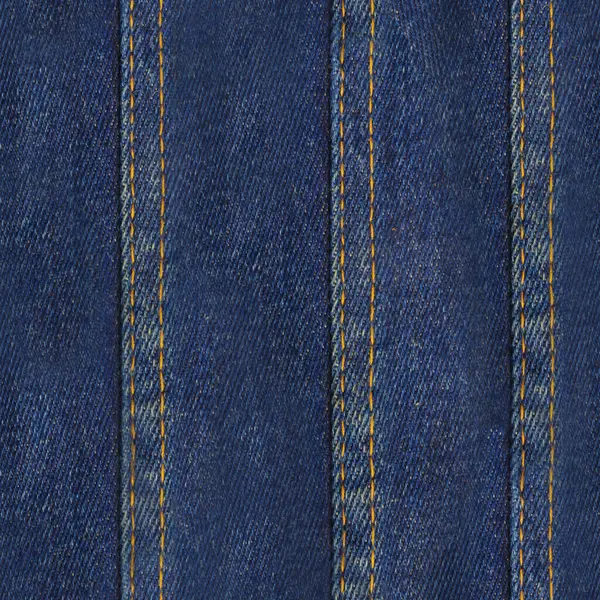 縦の青いステッチされたデニムまたはジーンズ材料の継ぎ目が無い質の写真 — ストック写真