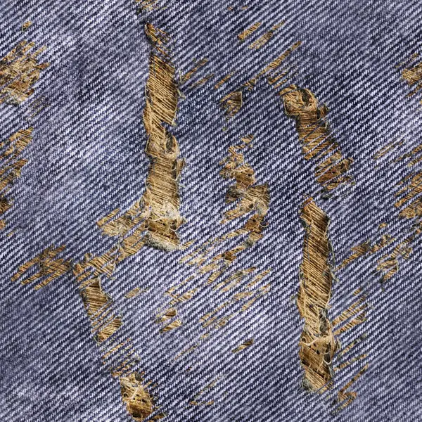 青い着色された引き裂かれたおよび身に着けられたデニムかジーンズ材料の継ぎ目が無い質の写真 — ストック写真