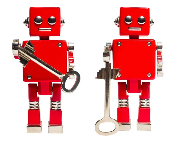 Foto Terisolasi Dari Robot Mainan Merah Memegang Kunci Pada Latar — Stok Foto