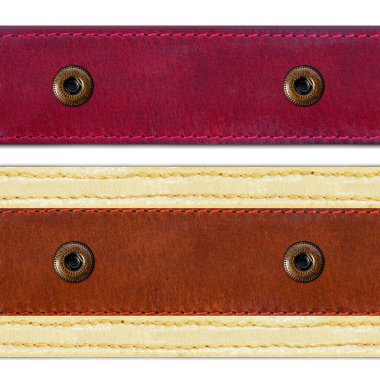 Deri kahverengi ve kırmızı renkli perçin ve beyaz arka planda perçin olan kusursuz izole bir fotoğraf..