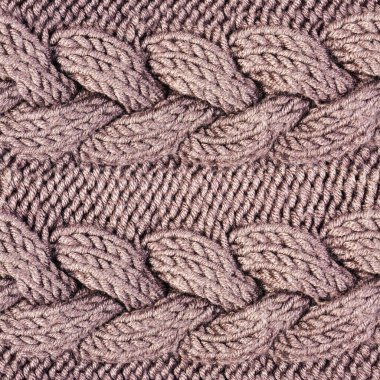 Kahverengi renkli süslemeli ve desenli yün kazak kumaşının kusursuz 4k fotoğraf dokusu.