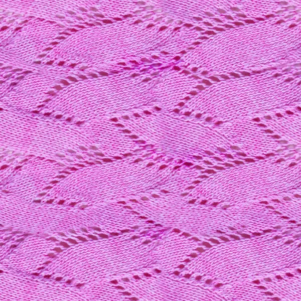 Pembe desenli örülmüş yün kazak kumaşının kusursuz 4k fotoğraf dokusu.