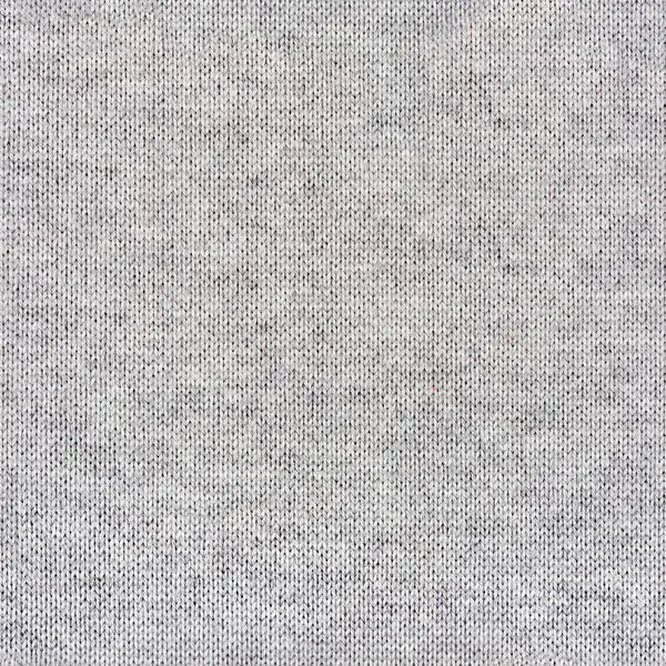 Açık gri renkli yün örülmüş süveter kumaş kumaşının kusursuz 4k fotoğraf dokusu.