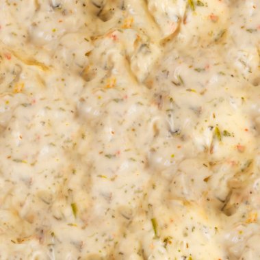 Sarımsaklı mayonez sosunun kusursuz 4k fotoğraf deseni..